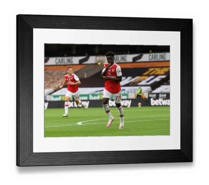 Framed Print : Saka's Stunner: Arsenal's Victory at Wolverhampton Wanderers (2019-2020)