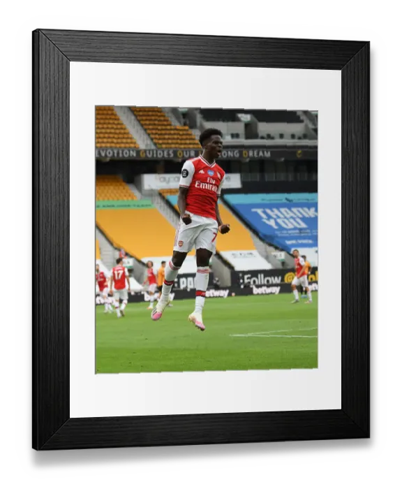Framed Print : Saka Scores: Arsenal's Victory at Wolverhampton Wanderers (2019-2020) Framed Print : Saka Scores: Arsenal's Victory at Wolverhampton Wanderers (2019-2020)