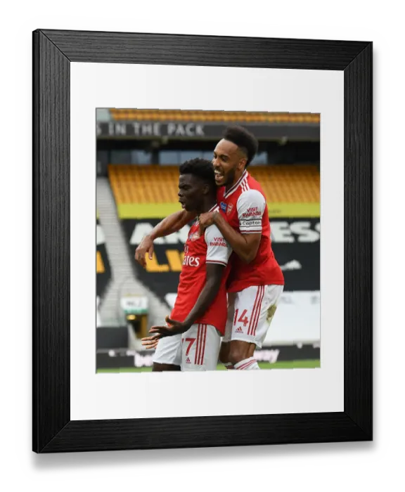 Framed Print : Saka and Aubameyang Celebrate Arsenal's First Goal Against Wolverhampton Wanderers (2019-20)