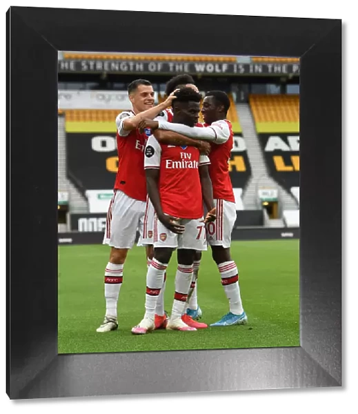 Saka, Xhaka, and Nketiah: Arsenal's Triumphant Moment at Wolverhampton Wanderers (2019-20)