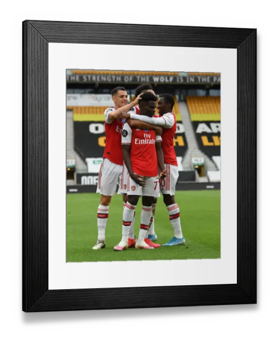 Framed Print : Saka, Xhaka, and Nketiah: Arsenal's Triumphant Moment at Wolverhampton Wanderers (2019-20)