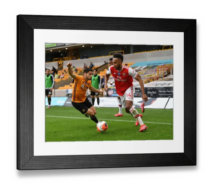 Framed Print : Aubameyang vs Neto: Intense Battle in Wolverhampton Wanderers vs Arsenal FC Premier League Clash