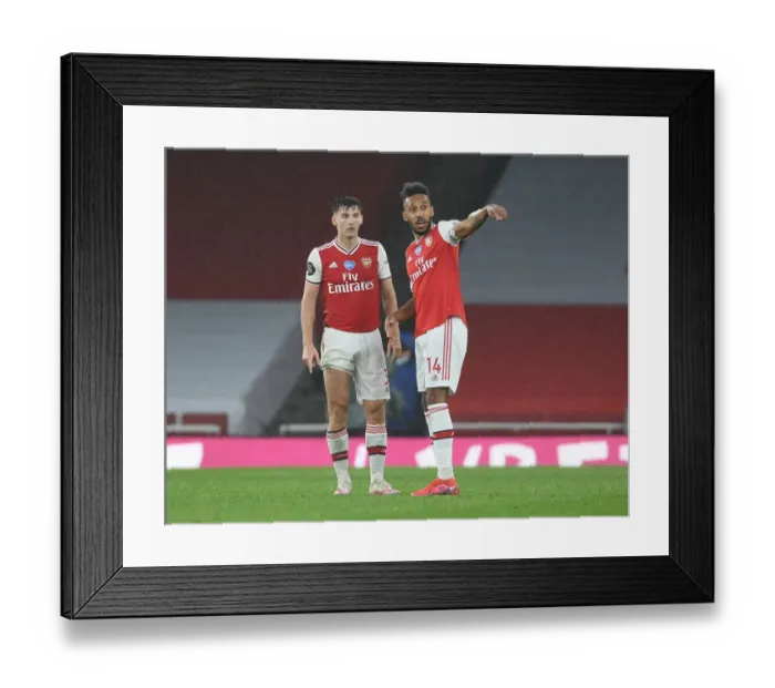 Framed Print : Arsenal's Tierney and Aubameyang in Action against Leicester City (2019-20) Framed Print : Arsenal's Tierney and Aubameyang in Action against Leicester City (2019-20)