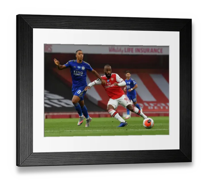 Framed Print : Arsenal's Lacazette Faces Off Against Leicester's Tielemans in Premier League Clash Framed Print : Arsenal's Lacazette Faces Off Against Leicester's Tielemans in Premier League Clash