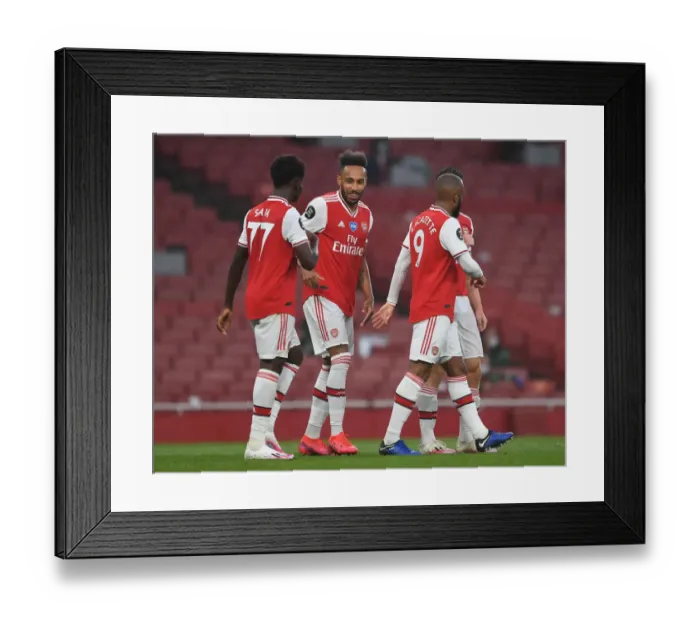 Framed Print : Aubameyang and Saka Celebrate Arsenal's Goal Against Leicester City (2019-20) Framed Print : Aubameyang and Saka Celebrate Arsenal's Goal Against Leicester City (2019-20)