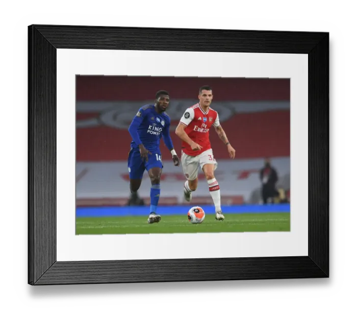 Framed Print : Xhaka vs Iheanacho: A Premier League Showdown at Emirates