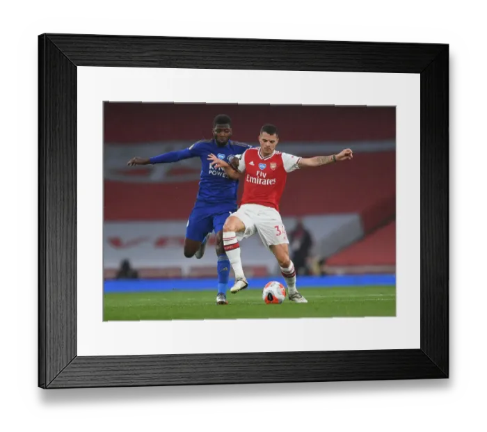 Framed Print : Xhaka vs Iheanacho: A Premier League Battle at Emirates Stadium Framed Print : Xhaka vs Iheanacho: A Premier League Battle at Emirates Stadium