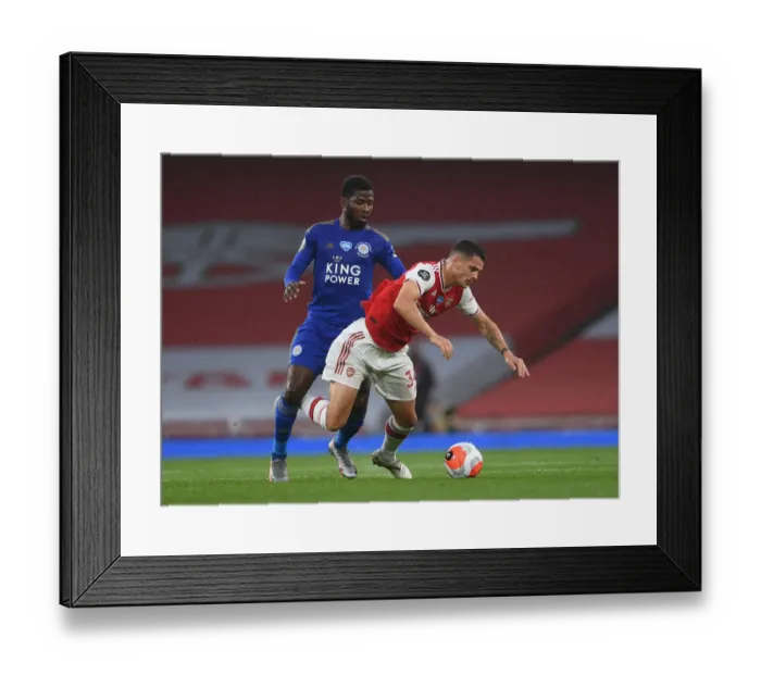 Framed Print : Xhaka vs Iheanacho: A Premier League Battle at Emirates - Arsenal vs Leicester