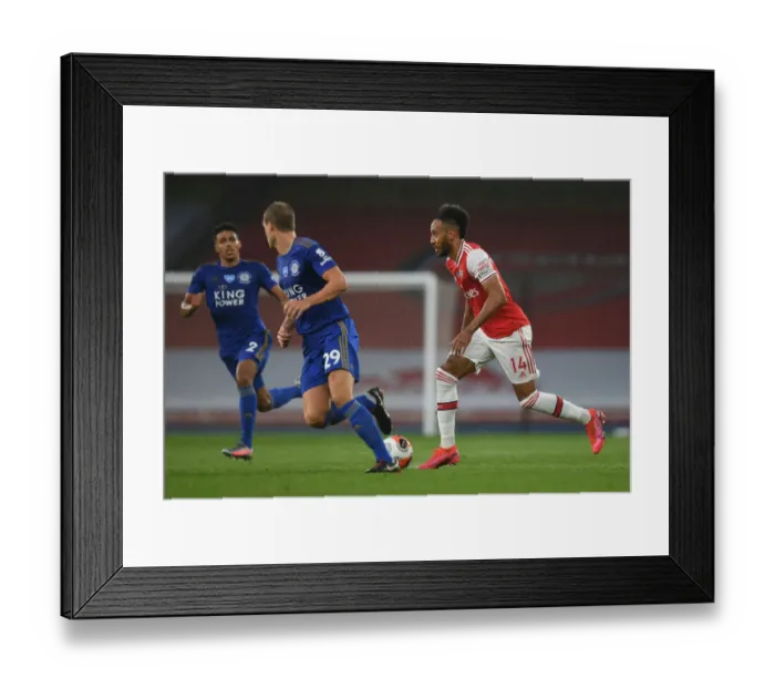 Framed Print : Arsenal's Aubameyang Faces Off Against Leicester City in Premier League Showdown
