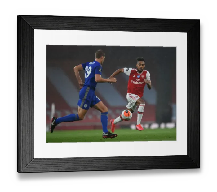 Framed Print : Arsenal's Aubameyang Goes Head-to-Head with Leicester City in Premier League Clash