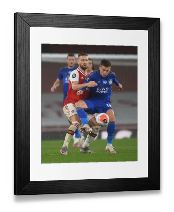 Framed Print : Arsenal vs Leicester: Mustafi Clashes with Barnes in Intense Premier League Showdown