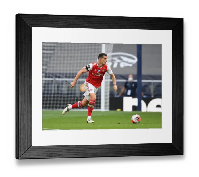 Framed Print : Granit Xhaka in the Heart of the Arsenal-Tottenham Rivalry: Premier League Clash 2019-2020