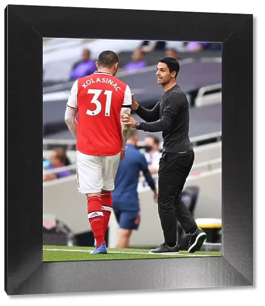 Mikel Arteta Coaches Arsenal Against Tottenham Hotspur in Premier League Clash (2019-20)