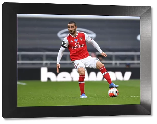Sead Kolasinac of Arsenal Faces Off Against Tottenham Hotspur in Premier League Clash (2019-20)