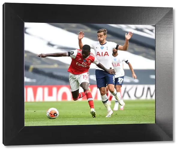 Nicolas Pepe Breaks Past Harry Winks: Intense Moment from Tottenham vs. Arsenal Premier League Clash (2019-20)
