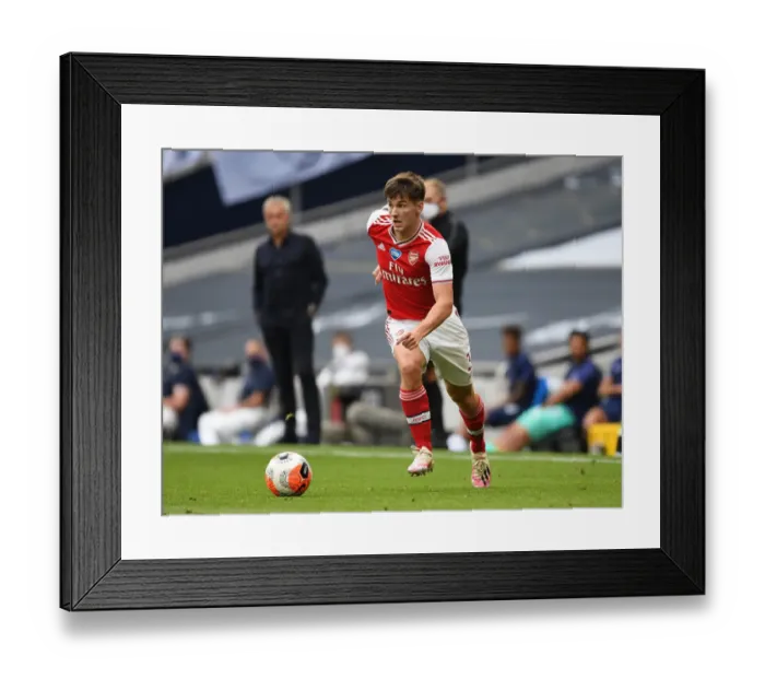 Framed Print : Arsenal's Kieran Tierney in Action Against Tottenham Hotspur in the Premier League (2019-20)