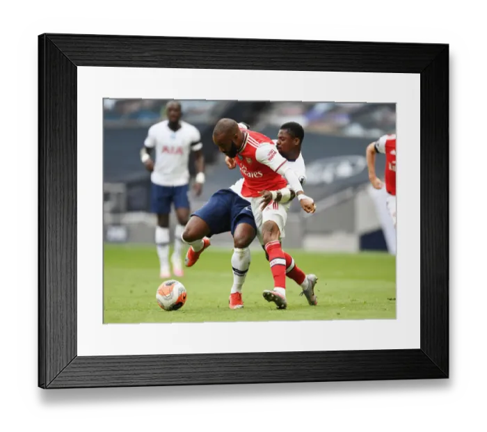 Framed Print : Tottenham vs. Arsenal: Lacazette Fouls Aurier Amidst Premier League Rivalry (2019-20)