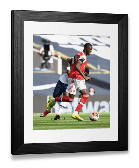 Framed Print : North London Rivalry: Pepe vs Aurier Clash - Premier League 2019-2020 Framed Print : North London Rivalry: Pepe vs Aurier Clash - Premier League 2019-2020