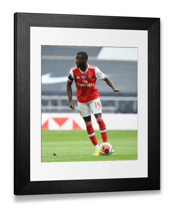 Framed Print : Nicolas Pepe in Action: Arsenal vs. Tottenham Hotspur, Premier League 2019-2020 Framed Print : Nicolas Pepe in Action: Arsenal vs. Tottenham Hotspur, Premier League 2019-2020