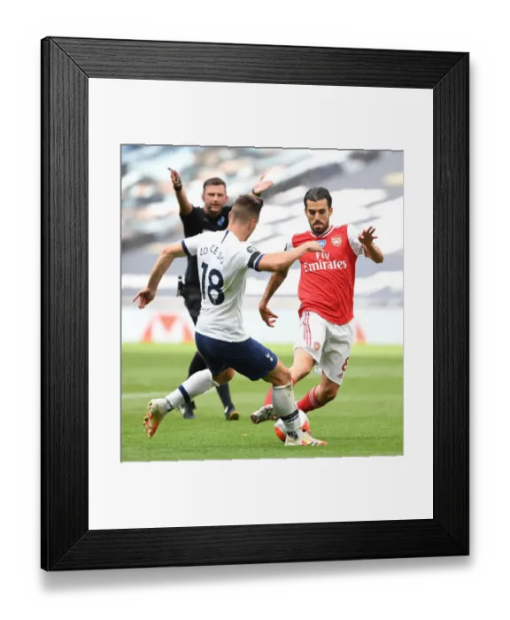 Framed Print : Dani Ceballos vs. Giovani Lo Celso: Battle in the Premier League Clash Between Tottenham and Arsenal Framed Print : Dani Ceballos vs. Giovani Lo Celso: Battle in the Premier League Clash Between Tottenham and Arsenal