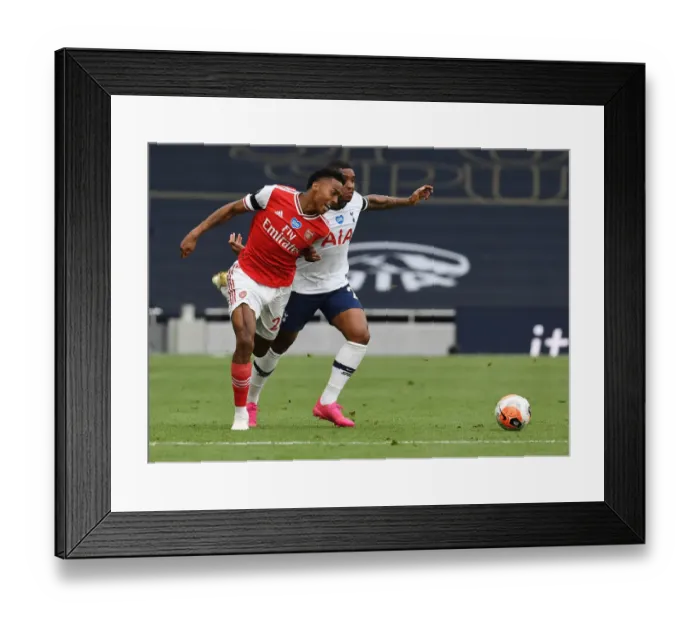 Framed Print : Clash in the Capital: Intense Moment between Joe Willock and Steven Bergwijn in the Premier League Battle between Tottenham and Arsenal (2019-20)
