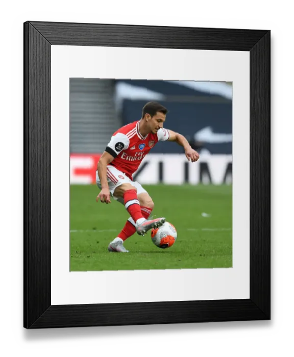 Framed Print : Arsenal's Cedric Faces Off Against Tottenham in Intense Premier League Rivalry