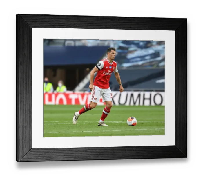 Framed Print : Granit Xhaka: Arsenal vs. Tottenham Clash in Premier League 2019-2020 Framed Print : Granit Xhaka: Arsenal vs. Tottenham Clash in Premier League 2019-2020