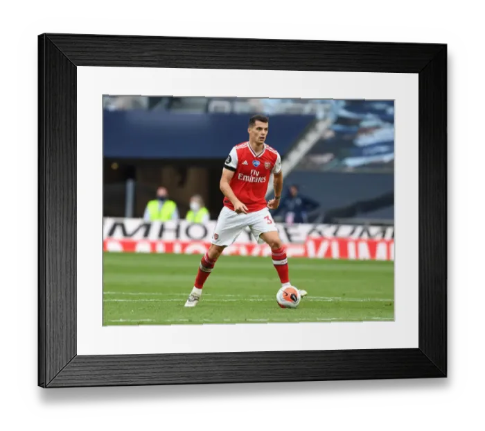 Framed Print : Granit Xhaka: Battle of the London Derby - Arsenal vs. Tottenham Hotspur, Premier League 2019-2020 Framed Print : Granit Xhaka: Battle of the London Derby - Arsenal vs. Tottenham Hotspur, Premier League 2019-2020
