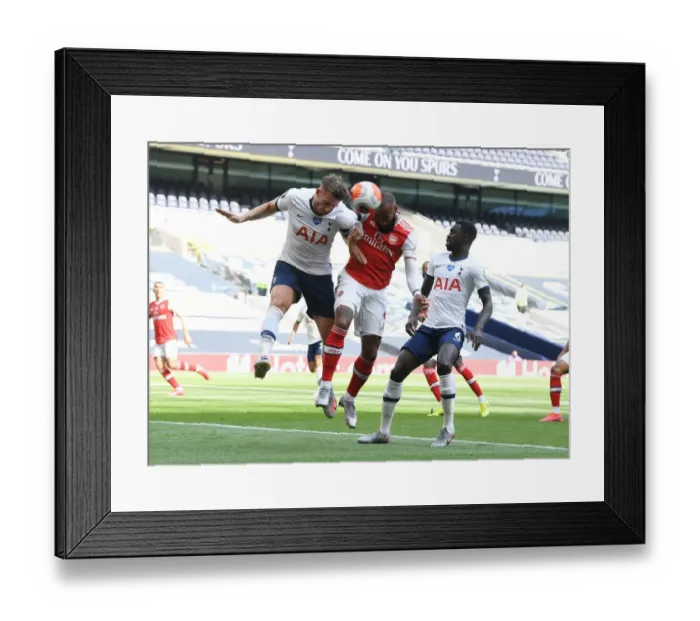 Framed Print : Clash in the Capital: Lacazette vs Alderweireld in the Tottenham-Arsenal Premier League Showdown Framed Print : Clash in the Capital: Lacazette vs Alderweireld in the Tottenham-Arsenal Premier League Showdown