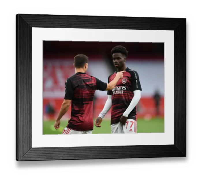 Framed Print : Arsenal's Bukayo Saka at Empty Emirates Stadium: Arsenal FC vs Liverpool FC, Premier League 2019-2020 Framed Print : Arsenal's Bukayo Saka at Empty Emirates Stadium: Arsenal FC vs Liverpool FC, Premier League 2019-2020