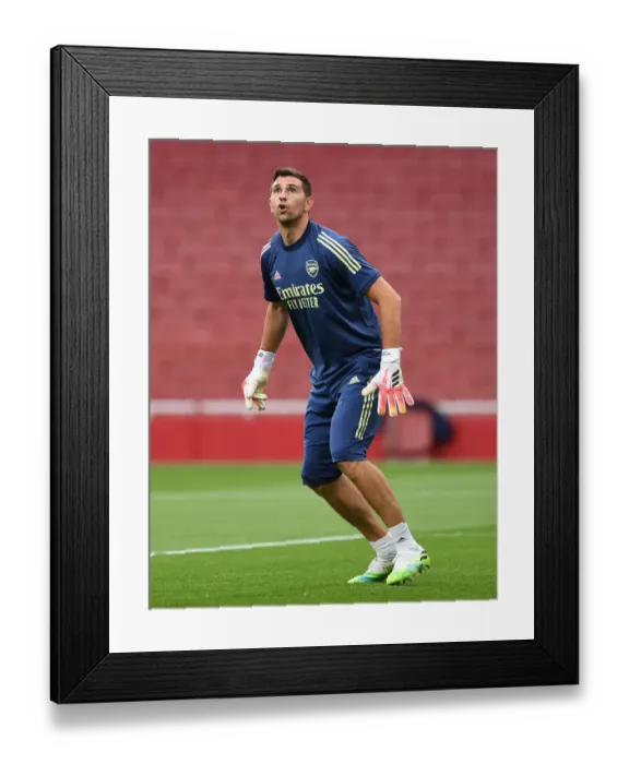 Framed Print : Arsenal's Emi Martinez Prepares for Empty Arsenal FC vs. Liverpool FC Clash (2019-20)
