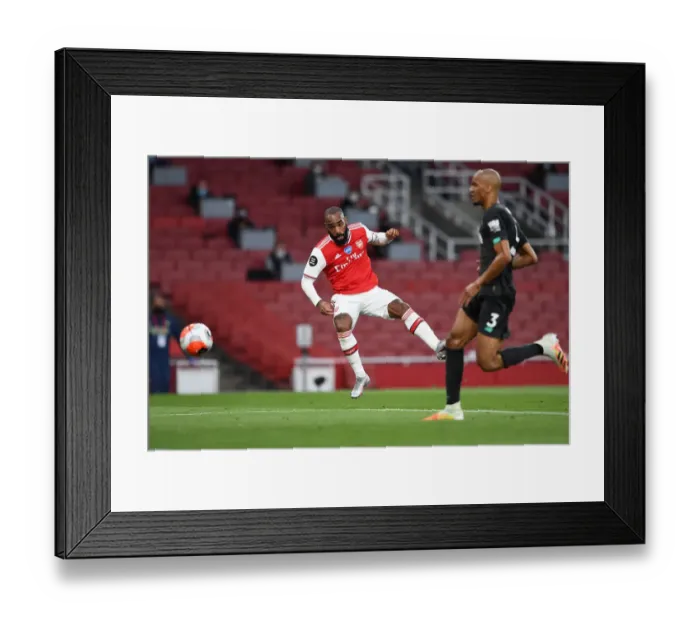 Framed Print : Arsenal's Lacazette Scores Historic First Goal in Empty Emirates Against Liverpool (2019-20) Framed Print : Arsenal's Lacazette Scores Historic First Goal in Empty Emirates Against Liverpool (2019-20)
