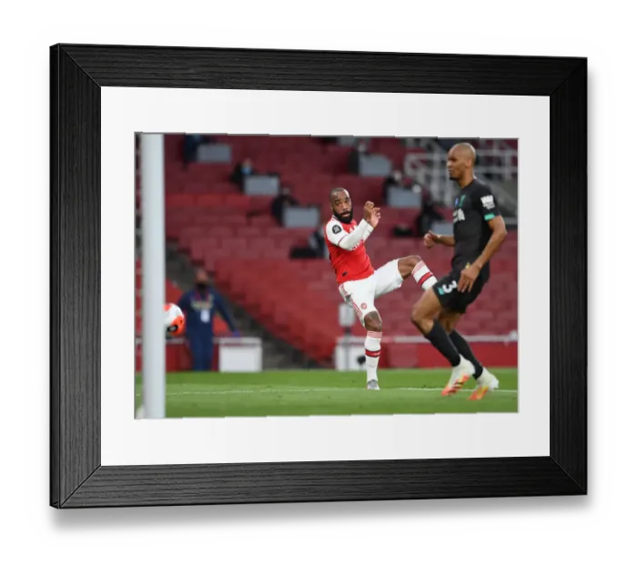 Framed Print : Arsenal's Lacazette Scores First Goal in Empty Emirates Stadium: Arsenal vs. Liverpool (2019-2020)