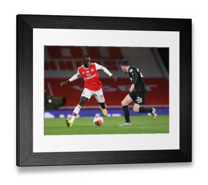 Framed Print : Arsenal vs. Liverpool: Empty-stadium Clash in the Premier League (Pepe vs. Robertson, 2019-20)