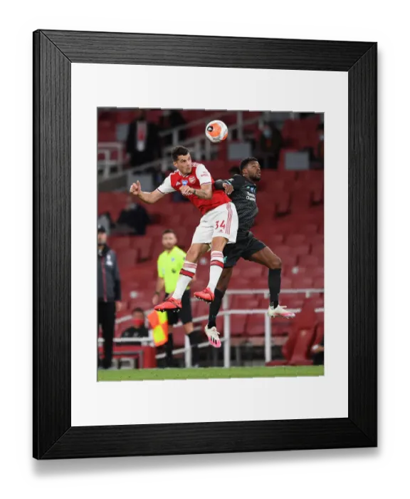 Framed Print : Arsenal vs. Liverpool: Empty-Stand Clash - Xhaka vs. Wijnaldum, Premier League 2019-20 Framed Print : Arsenal vs. Liverpool: Empty-Stand Clash - Xhaka vs. Wijnaldum, Premier League 2019-20
