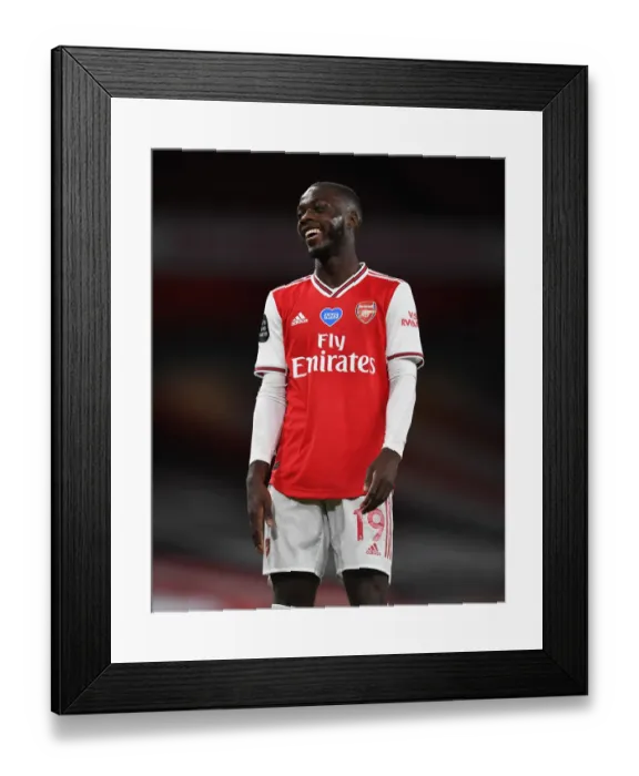 Framed Print : Arsenal's Nicolas Pepe in Empty Emirates Stadium: Arsenal FC vs Liverpool FC, Premier League 2019-2020 Framed Print : Arsenal's Nicolas Pepe in Empty Emirates Stadium: Arsenal FC vs Liverpool FC, Premier League 2019-2020