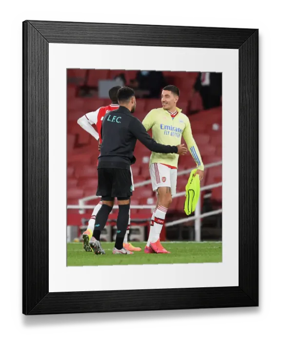 Framed Print : Arsenal's Bitter-Sweet Reunion: Hector Bellerin Embraces Oxlade-Chamberlain Amid Empty Emirates Framed Print : Arsenal's Bitter-Sweet Reunion: Hector Bellerin Embraces Oxlade-Chamberlain Amid Empty Emirates
