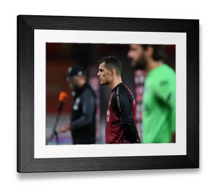 Framed Print : Empty Emirates: Xhaka Addresses Liverpool Showdown Amidst 2019-2020 Premier League's Ghostly Atmosphere Framed Print : Empty Emirates: Xhaka Addresses Liverpool Showdown Amidst 2019-2020 Premier League's Ghostly Atmosphere