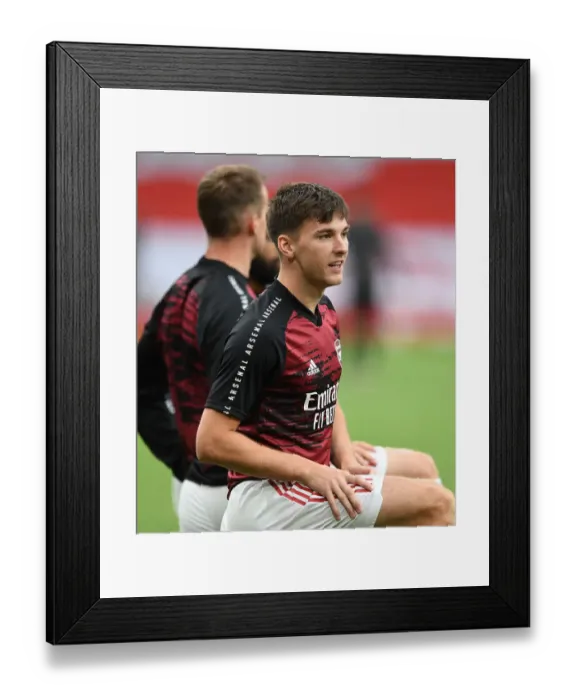 Framed Print : Arsenal's Kieran Tierney Prepares for Empty Emirates: Arsenal v Liverpool, Premier League 2019-2020