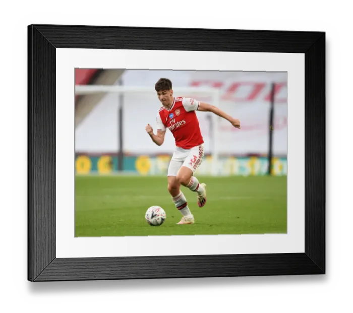 Framed Print : Arsenal's Kieran Tierney Goes Head-to-Head with Manchester City in FA Cup Semi-Final Showdown