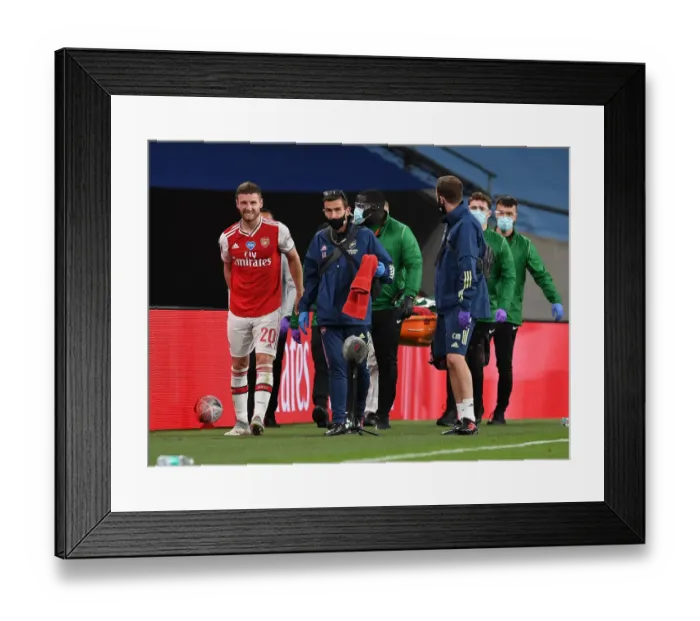 Framed Print : Arsenal's Injured Mustafi Exits FA Cup Semi-Final Against Manchester City Framed Print : Arsenal's Injured Mustafi Exits FA Cup Semi-Final Against Manchester City