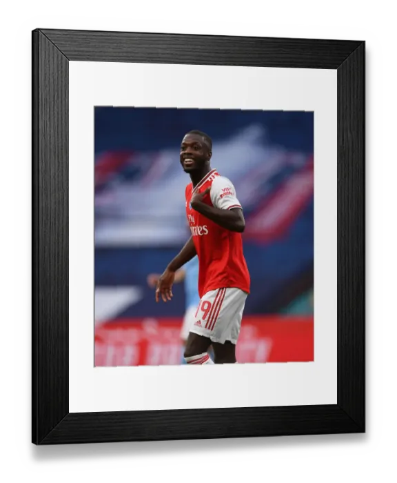 Framed Print : Arsenal's Nicolas Pepe in FA Cup Semi-Final Action Against Manchester City
