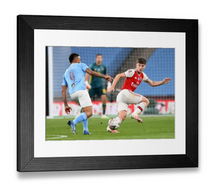 Framed Print : Arsenal's Kieran Tierney Goes Head-to-Head with Manchester City in FA Cup Semi-Final Clash
