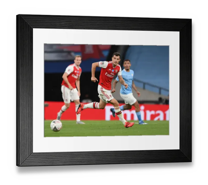Framed Print : Granit Xhaka in FA Cup Battle: Arsenal vs. Manchester City