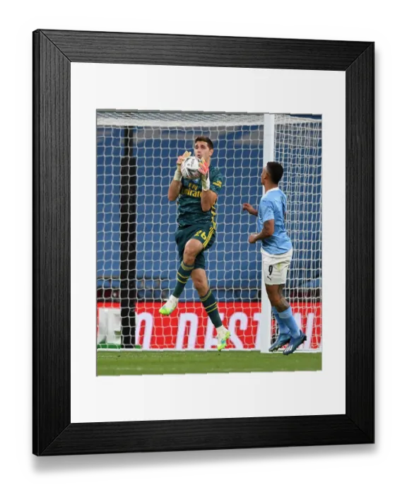 Framed Print : Arsenal's Emi Martinez in FA Cup Semi-Final Action Against Manchester City Framed Print : Arsenal's Emi Martinez in FA Cup Semi-Final Action Against Manchester City