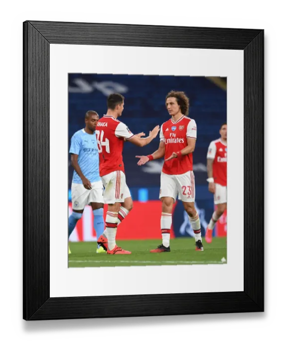 Framed Print : Arsenal's Xhaka and Luiz Embrace After FA Cup Semi-Final Showdown Against Manchester City Framed Print : Arsenal's Xhaka and Luiz Embrace After FA Cup Semi-Final Showdown Against Manchester City