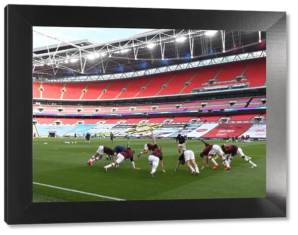 Arsenal vs Manchester City - FA Cup Semi-Final: Players Warm Up at Wembley Stadium
