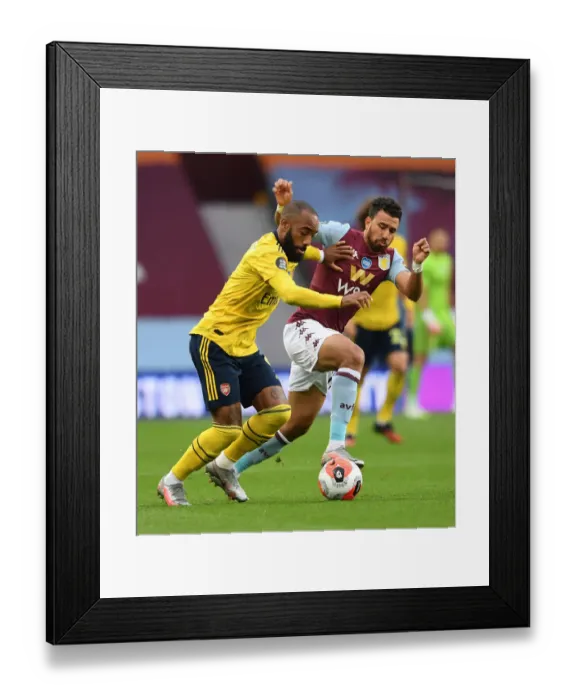 Framed Print : Lacazette vs Trezeguet: Intense Clash in Aston Villa vs Arsenal Premier League Showdown Framed Print : Lacazette vs Trezeguet: Intense Clash in Aston Villa vs Arsenal Premier League Showdown