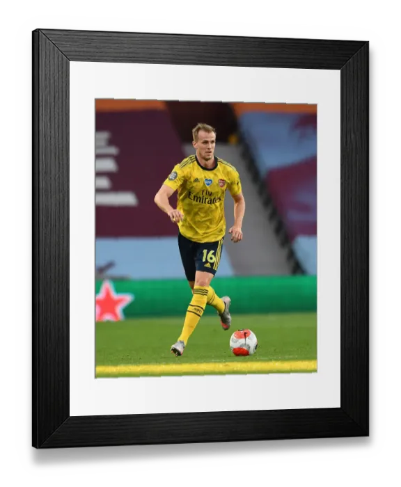 Framed Print : Rob Holding of Arsenal in Action against Aston Villa in Premier League Clash (2019-20)