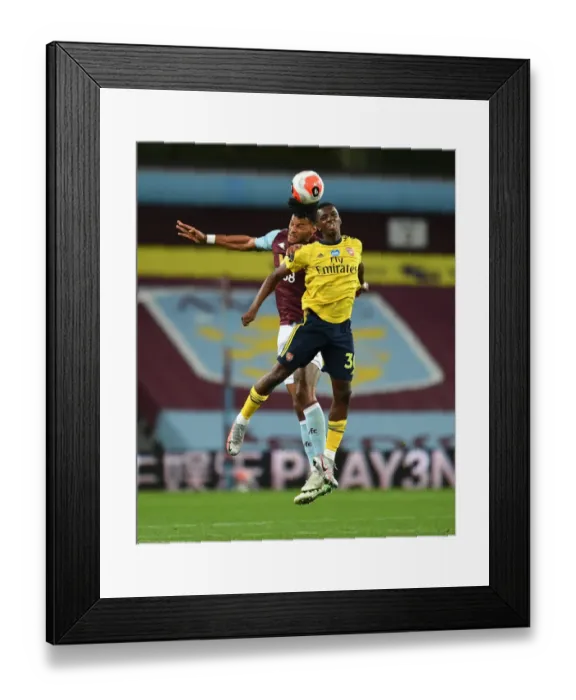 Framed Print : Clash at Villa Park: Nketiah vs. Mings in Premier League Showdown